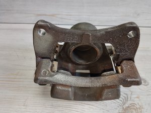 Суппорт передний левый #704 TOYOTA COROLLA OEM 4775020510 NZE121 2006
